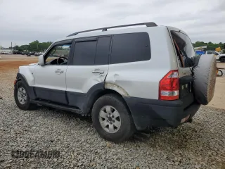 2003 Mitsubishi Montero Limited z VIN JA4NW51S23J020616, wystawiony jako Copart lot #56036365 z przebiegiem 200 785 mil mil oraz Szkody całkowita. Historia ofert i sprzedaży dostępna na DreamBid. Obrazek 2.