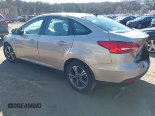 2018 Ford Focus SE with VIN 1FADP3FE8JL256698, listed as a IAAI auction lot 41757179 with 118,498 mi miles. Bid and sale history available at carsss.com. Image 3.