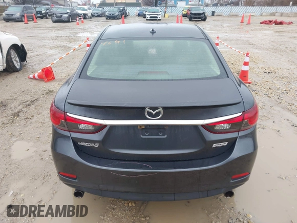 2015 Mazda 6 i Grand Touring with VIN JM1GJ1W56F1207077, listed as a IAAI auction lot 41734641 with 109,447 mi miles and . Bid and sale history available at DreamBid. Image 16.
