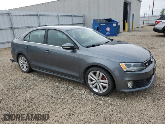 2014 Volkswagen Jetta GLI z VIN 3VW4T7AJ2EM245201, wystawiony jako Copart lot #64901935 z przebiegiem 147 799 mil mil oraz Czysty tytuł • Clean title. Historia ofert i sprzedaży dostępna na DreamBid. Obrazek 4.
