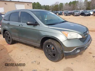 2007 Honda CR-V LX with VIN JHLRE38307C017076, listed as a IAAI auction lot 41767875 with 221,195 mi miles. Bid and sale history available at carsss.com. Image 1.
