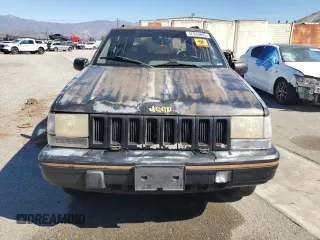 1993 Jeep Grand Cherokee Limited with VIN 1J4GZ78S3PC502345, listed as a Copart auction lot 46933805 with 121,652 mi miles and Salvage title. Bid and sale history available at DreamBid. Image 5.