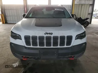 2022 Jeep Cherokee Trailhawk with VIN 1C4PJMBX6ND556259, listed as a Copart auction lot 44730605 with 55,328 mi miles and Non Repairable. Bid and sale history available at carsss.com. Image 5.