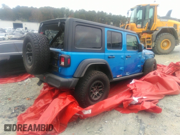 2021 Jeep Wrangler Unlimited Rubicon with VIN 1C4JJXFG3MW833275, listed as a IAAI auction lot 39371948 with 43,428 mi miles. Bid and sale history available at carsss.com. Image 4.