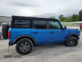 2023 Ford Bronco z VIN 1FMDE5BH7PLB11989, wystawiony jako Copart lot #58302125 z przebiegiem 25 526 mil mil oraz Szkoda całkowita • Salvage title. Historia ofert i sprzedaży dostępna na DreamBid. Obrazek 3.