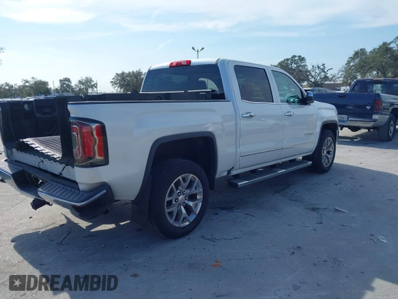 2017 GMC Sierra 1500 SLT with VIN 3GTP1NECXHG423591, listed as a IAAI auction lot 41509177 with 100,071 mi miles and . Bid and sale history available at DreamBid. Image 4.