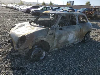 2015 MINI Hardtop with VIN WMWXM5C57F3A59013, listed as a Copart auction lot 51380625 with Not Provided miles and Non Repairable. Bid and sale history available at DreamBid. Image 1.