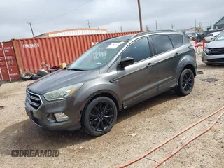 2017 Ford Escape SE with VIN 1FMCU0G99HUC65571, listed as a IAAI auction lot 41923517 with 77,179 mi miles and . Bid and sale history available at DreamBid. Image 17.