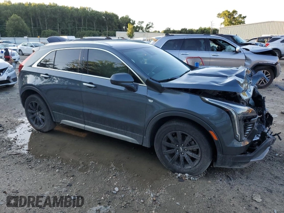 2019 Cadillac XT4 FWD Premium Luxury z VIN 1GYFZCR47KF123621, wystawiony jako Copart lot #69766894 z przebiegiem 68 191 mil mil oraz Szkody całkowita. Historia ofert i sprzedaży dostępna na DreamBid. Obrazek 4.