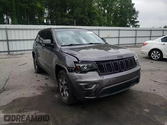 2021 Jeep Grand Cherokee 80th Anniversary z VIN 1C4RJEBG7MC679667, wystawiony jako Copart lot #54167225 z przebiegiem 77 268 mil mil oraz Szkoda całkowita • Salvage title. Historia ofert i sprzedaży dostępna na DreamBid. Obrazek 14.
