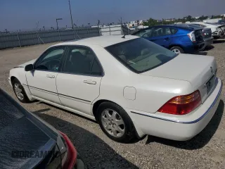 2002 Acura RL z VIN JH4KA96522C011028, wystawiony jako Copart lot #61027505 z przebiegiem 104 094 mil mil oraz Szkoda całkowita • Salvage title. Historia ofert i sprzedaży dostępna na DreamBid. Obrazek 2.