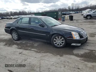 2008 Cadillac DTS 1SD z VIN 1G6KD57Y68U203116, wystawiony jako Copart lot #50050045 z przebiegiem 81 777 mil mil oraz Szkoda całkowita • Salvage title. Historia ofert i sprzedaży dostępna na DreamBid. Obrazek 4.