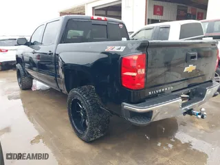 2015 Chevrolet Silverado 1500 LT with VIN 3GCUKREH8FG239959, listed as a IAAI auction lot 41483334 with 180,739 mi miles. Bid and sale history available at carsss.com. Image 3.