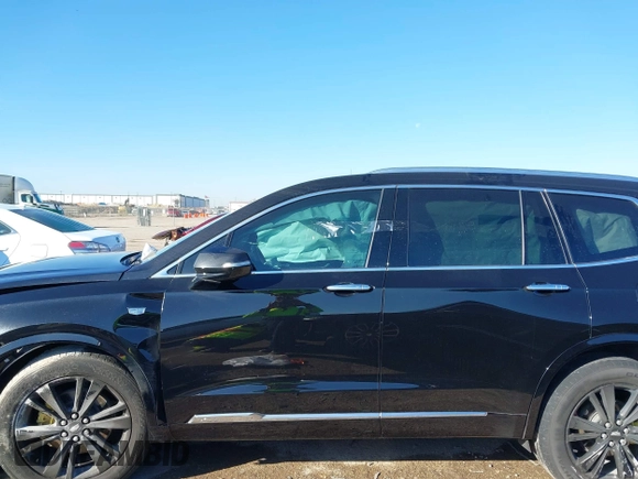 2022 Cadillac XT6 Premium Luxury with VIN 1GYKPCRS1NZ121711, listed as a IAAI auction lot 41149624 with 62,887 mi miles and . Bid and sale history available at DreamBid. Image 14.
