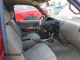 2000 Toyota Tacoma PreRunner with VIN 5TESM92N7YZ703049, listed as a IAAI auction lot 42597260 with 193,291 mi miles and . Bid and sale history available at DreamBid. Image 5.