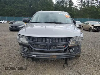 2019 Dodge Journey SE z VIN 3C4PDCBB4KT738442, wystawiony jako Copart lot #55329095 z przebiegiem 93 095 mil mil oraz Szkoda całkowita • Salvage title. Historia ofert i sprzedaży dostępna na DreamBid. Obrazek 5.