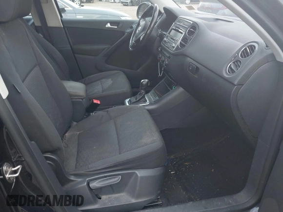 2013 Volkswagen Tiguan S with VIN WVGAV3AX4DW572884, listed as a IAAI auction lot 41626981 with 243,188 mi miles and . Bid and sale history available at DreamBid. Image 5.