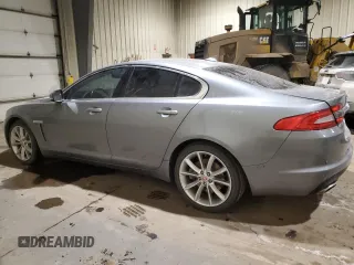 2015 Jaguar XF with VIN SAJXJ0EF1F8U48283, listed as a Copart auction lot 81004054 with 77,828 mi miles and Clean Title. Bid and sale history available at DreamBid. Image 2.