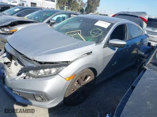 2019 Honda Civic Sedan Sport with VIN 19XFC2F84KE200822, listed as a IAAI auction lot 41753976 with 77,090 mi miles. Bid and sale history available at carsss.com. Image 2.