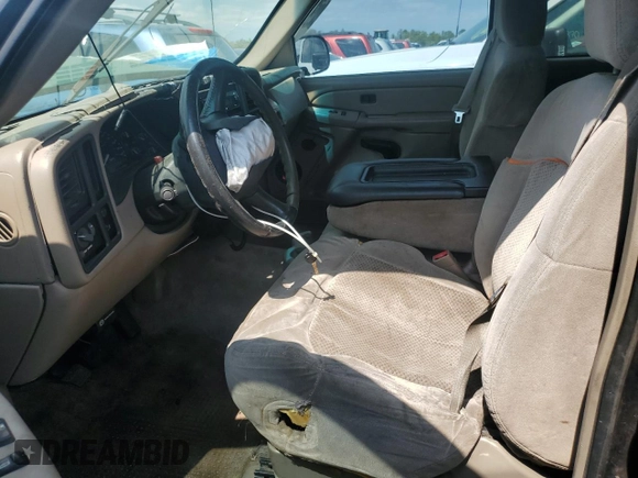 2001 Chevrolet Silverado 1500 LS with VIN 1GCEC19V01E169893, listed as a Copart auction lot 48826955 with 147,722 mi miles and Salvage Title. Bid and sale history available at DreamBid. Image 7.