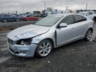 2016 Volvo S60 T5 Drive-E Premier with VIN YV126MFK4G2409294, listed as a Copart auction lot 87837825 with 124,249 mi miles and Salvage Title. Bid and sale history available at carsss.com. Image 1.