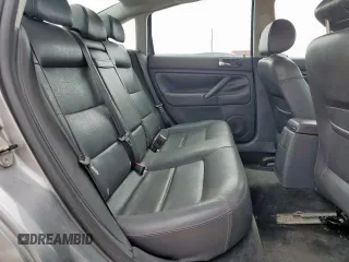 2004 Volkswagen Passat GLS z VIN WVWPD63B04P325358, wystawiony jako Copart lot #57180485 z przebiegiem 195 553 mil mil oraz Czysty tytuł • Clean title. Historia ofert i sprzedaży dostępna na DreamBid. Obrazek 10.