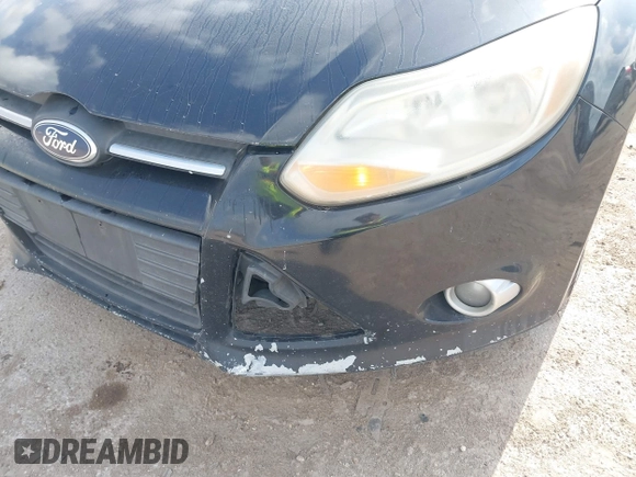 2012 Ford Focus SE with VIN 1FAHP3F24CL381806, listed as a IAAI auction lot 42058773 with Not Provided miles and . Bid and sale history available at DreamBid. Image 6.
