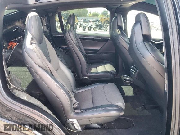 2017 Tesla Model X 90D with VIN 5YJXCBE20HF051099, listed as a Copart auction lot 52208205 with 118,828 mi miles and Salvage Title. Bid and sale history available at DreamBid. Image 11.