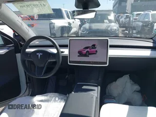 2024 Tesla Model Y with VIN 7SAYGDED2RF017448, listed as a IAAI auction lot 41597056 with 9,702 mi miles and . Bid and sale history available at DreamBid. Image 20.