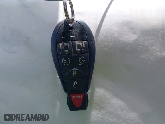 2012 Dodge Grand Caravan SXT with VIN 2C4RDGCG9CR200432, listed as a IAAI auction lot 42027477 with 99,076 mi miles and . Bid and sale history available at DreamBid. Image 11.