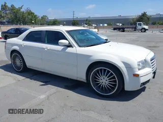 2006 Chrysler 300 Touring z VIN 2C3KA53G56H476717, wystawiony jako IAAI lot #42490325 z przebiegiem 170 171 mil mil oraz . Historia ofert i sprzedaży dostępna na DreamBid. Obrazek 1.