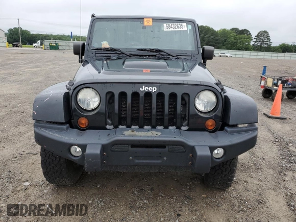 2012 Jeep Wrangler Unlimited Call of Duty MW3 with VIN 1C4BJWFG0CL218214, listed as a Copart auction lot 58432635 with 109,128 mi miles and Clean title. Bid and sale history available at DreamBid. Image 5.