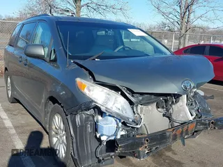 2011 Toyota Sienna XLE AAS with VIN 5TDYK3DC4BS072693, listed as a IAAI auction lot 41579262 with 146,201 mi miles. Bid and sale history available at carsss.com. Image 1.