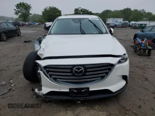 2021 Mazda CX-9 Touring with VIN JM3TCBCY1M0517709, listed as a Copart auction lot 57624945 with 64,081 mi miles and Salvage title. Bid and sale history available at DreamBid. Image 5.