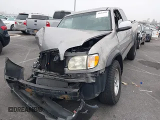 2003 Toyota Tundra SR5 with VIN 5TBBT44113S350273, listed as a IAAI auction lot 40482066 with 219,831 mi miles and . Bid and sale history available at DreamBid. Image 2.