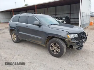 2017 Jeep Grand Cherokee Laredo with VIN 1C4RJFAG0HC739589, listed as a IAAI auction lot 41454746 with 133,868 mi miles. Bid and sale history available at carsss.com. Image 1.