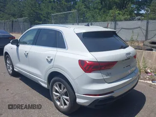 2021 Audi Q3 S line Premium Plus with VIN WA1EECF32M1047731, listed as a IAAI auction lot 39714835 with 15,939 mi miles and . Bid and sale history available at DreamBid. Image 3.