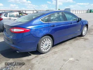 2014 Ford Fusion SE Hybrid с VIN 3FA6P0LU9ER129016, выставлен на аукционе IAAI как лот 42269103 с пробегом 170 001 миль миль и . История ставок и продаж доступна на DreamBid. Изображение 4.