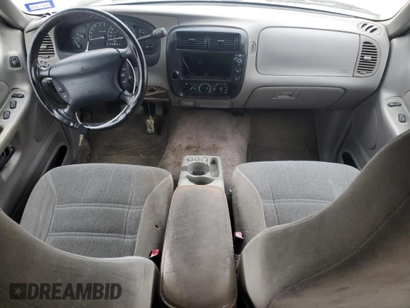 1999 Ford Explorer with VIN 1FMYU22E1XUA94061, listed as a Copart auction lot 44463165 with 172,246 mi miles and Salvage title. Bid and sale history available at DreamBid. Image 8.