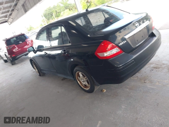 2009 Nissan Versa 1.8 S with VIN 3N1BC11E79L368680, listed as a IAAI auction lot 42090230 with 190,049 mi miles. Bid and sale history available at carsss.com. Image 3.