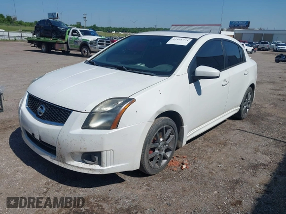 2012 Nissan Sentra SE-R z VIN 3N1BB6AP2CL670385, wystawiony jako IAAI lot #42431771 z przebiegiem 186 513 mil mil oraz . Historia ofert i sprzedaży dostępna na DreamBid. Obrazek 2.