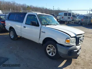 2009 Ford Ranger XL with VIN 1FTYR10DX9PA03395, listed as a IAAI auction lot 41103826 with 124,257 mi miles. Bid and sale history available at carsss.com. Image 1.
