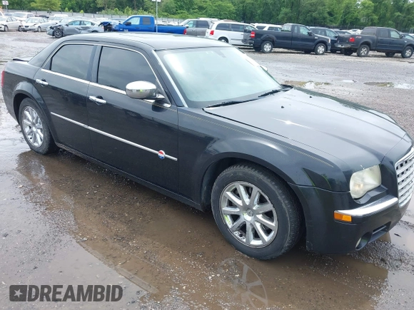 2006 Chrysler 300 C z VIN 2C3LA63H66H412270, wystawiony jako IAAI lot #42479868 z przebiegiem 143 476 mil mil oraz . Historia ofert i sprzedaży dostępna na DreamBid. Obrazek 1.