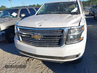 2019 Chevrolet Suburban Premier with VIN 1GNSCJKC0KR293658, listed as a IAAI auction lot 40563834 with 153,619 mi miles. Bid and sale history available at carsss.com. Image 12.