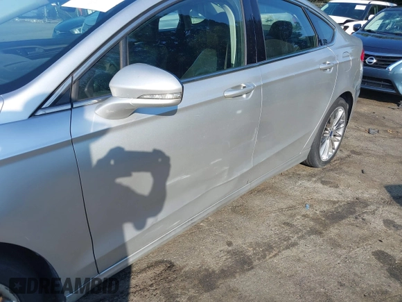 2013 Ford Fusion SE with VIN 3FA6P0H96DR274436, listed as a IAAI auction lot 42602958 with 239,224 mi miles and . Bid and sale history available at DreamBid. Image 18.