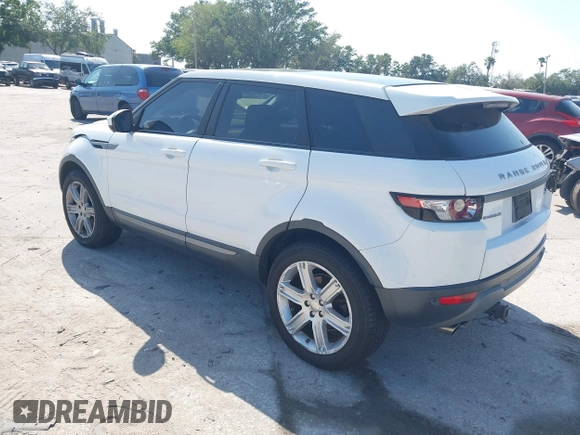 2015 Land Rover Range Rover Evoque Pure Premium z VIN SALVR2BG0FH964683, wystawiony jako IAAI lot #42016766 z przebiegiem 94 942 mil mil oraz . Historia ofert i sprzedaży dostępna na DreamBid. Obrazek 3.