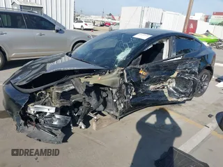 2019 Tesla Model 3 Mid Range with VIN 5YJ3E1EA0KF399082, listed as a IAAI auction lot 41697100 with 138,998 mi miles and . Bid and sale history available at carsss.com. Image 6.