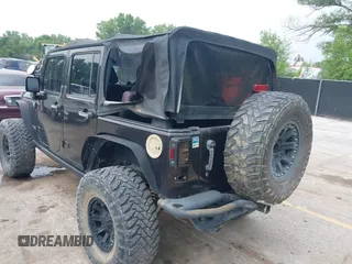 2013 Jeep Wrangler Unlimited Rubicon with VIN 1C4BJWFG5DL652050, listed as a IAAI auction lot 42451954 with 107,110 mi miles and . Bid and sale history available at DreamBid. Image 6.