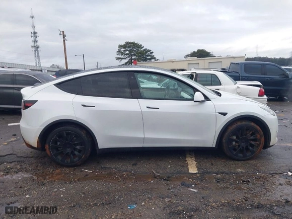 2020 Tesla Model Y Long Range with VIN 5YJYGDEEXLF020059, listed as a IAAI auction lot 41374959 with NaN miles. Bid and sale history available at carsss.com. Image 13.