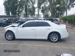 2012 Chrysler 300 C z VIN 2C3CCAET4CH236569, wystawiony jako IAAI lot #42181321 z przebiegiem 144 243 mil mil oraz . Historia ofert i sprzedaży dostępna na DreamBid. Obrazek 14.